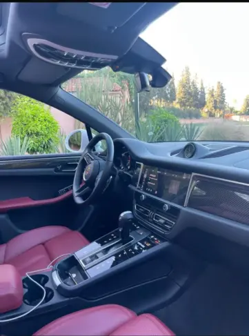 Porsche luxury car interior rental Marrakech Morocco red leather seats